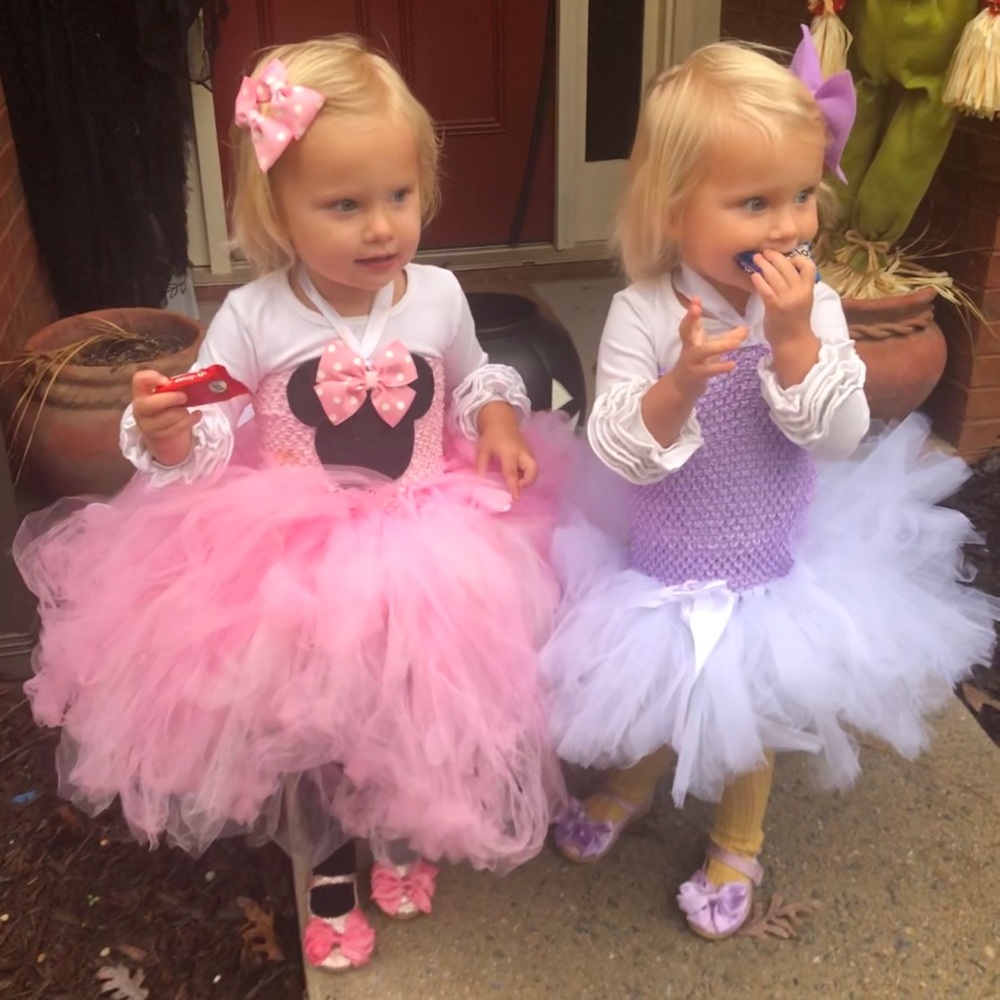 2T/3T Minnie Mouse and Daisy Costumes. Includes pink and purple hair clip.